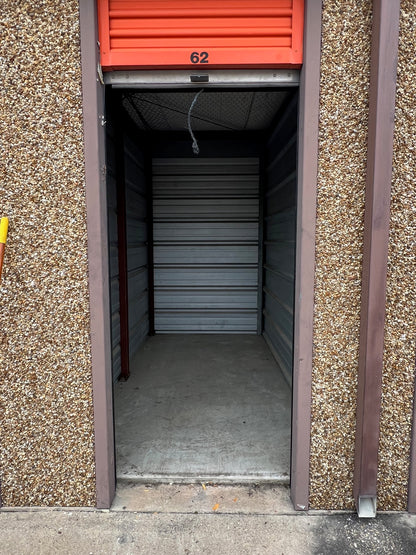 Picture of empty commercial storage unit cleaned out by All Wrights Services llc.