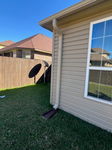 New guttering and down spout install with matching paint to home.